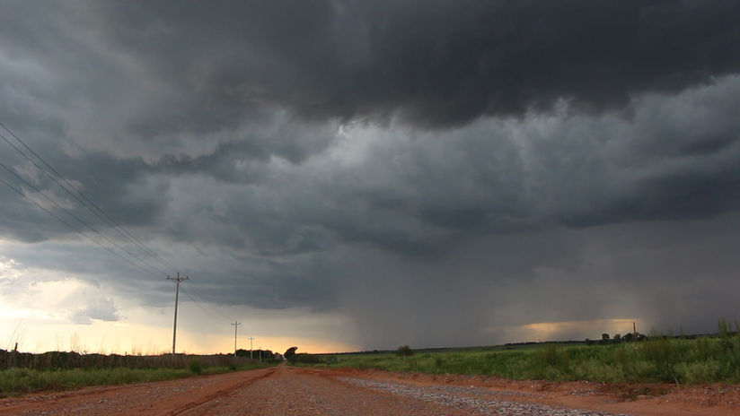 Stormy Skies Over Red Dirt Road